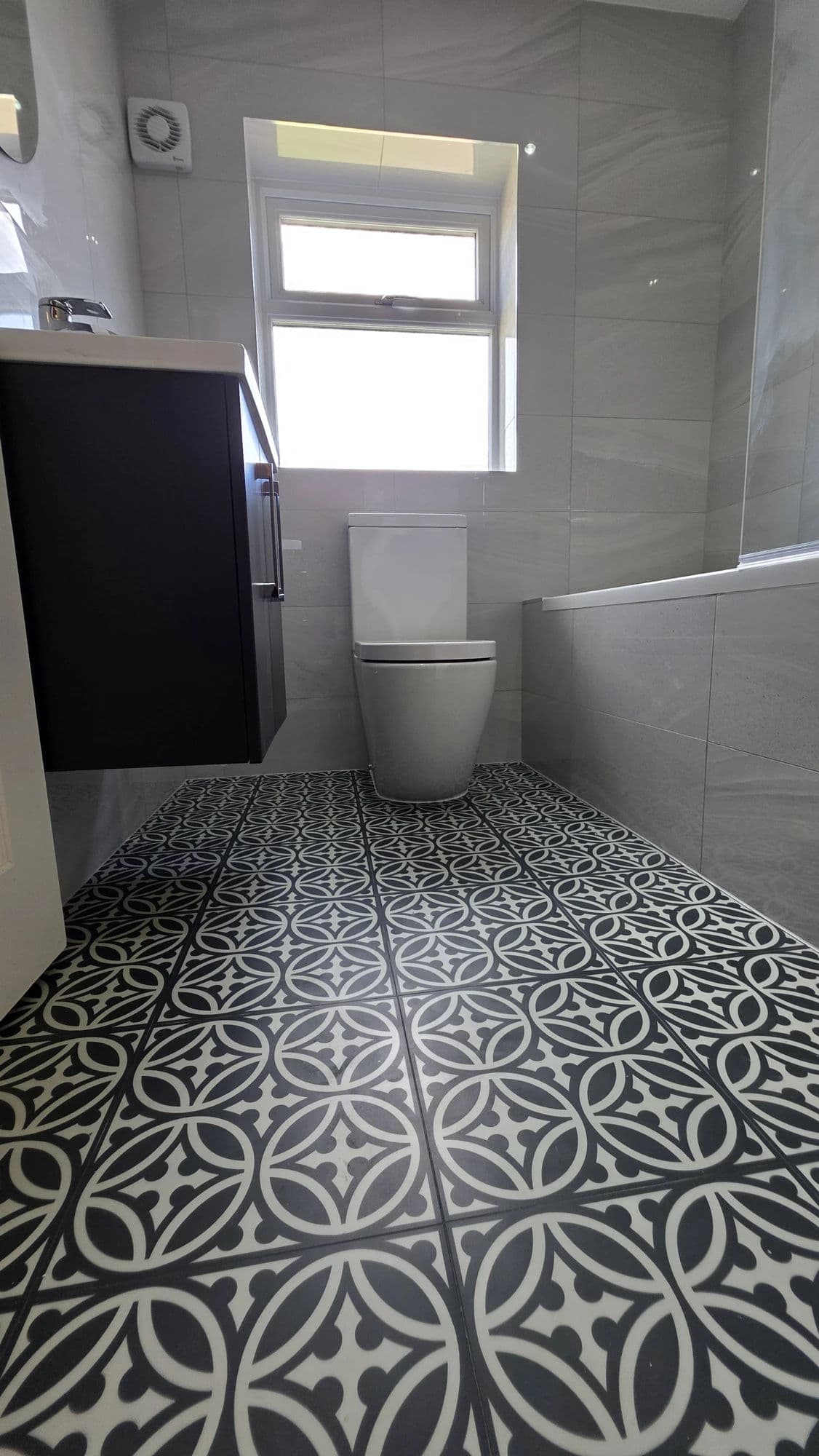Ingleby Barwick Main Bathroom Installation and Refurbishment with Patterned LVT in Ingleby Barwick — after completion. Services: Bathroom Installation, Shower Installation, Plumbing, Flooring, Bathroom Refurbishment, Bathroom Tiling, Bathtub Installation, Bathroom Renovation.