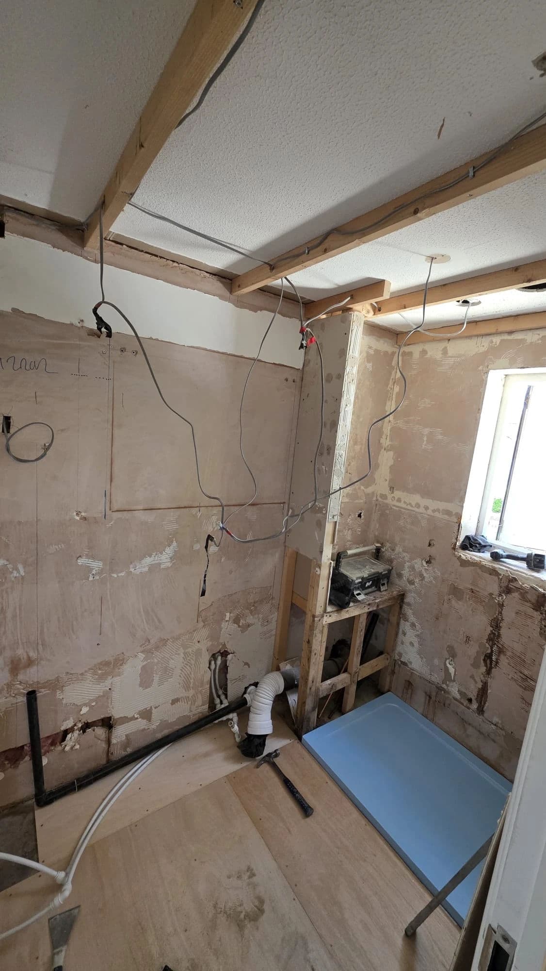 Norton Premium Bathroom Installation and Refurbishment with Large Shower and Dark Vanity in Stockton-on-Tees — before work began. Services: Bathroom Installation, Bathroom Refurbishment, Bathroom Tiling, Flooring, Shower Room, Shower Installation, Plumbing, Lighting, Bathroom Renovation.
