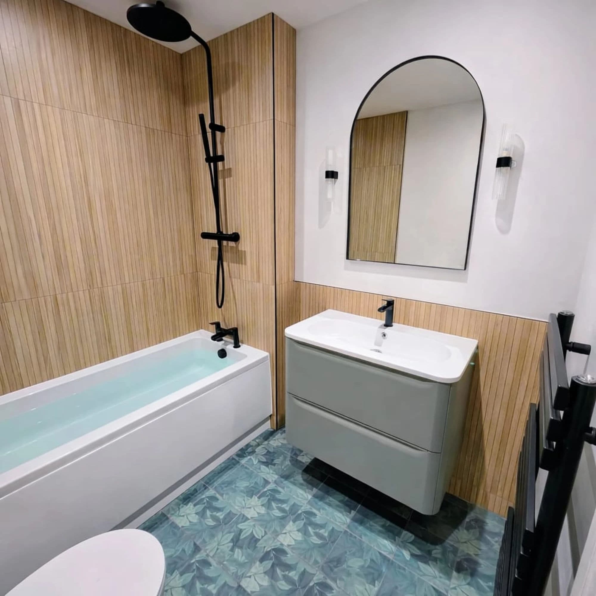 Stockton-on-Tees Bathroom Installation and Refurbishment with Structural Floor Rebuild in Stockton-on-Tees — after completion. Services: Bathroom Installation, Bathroom Tiling, Bathtub Installation, Flooring, Plumbing, Lighting, Shower Installation, Bathroom Renovation, Bathroom Refurbishment.