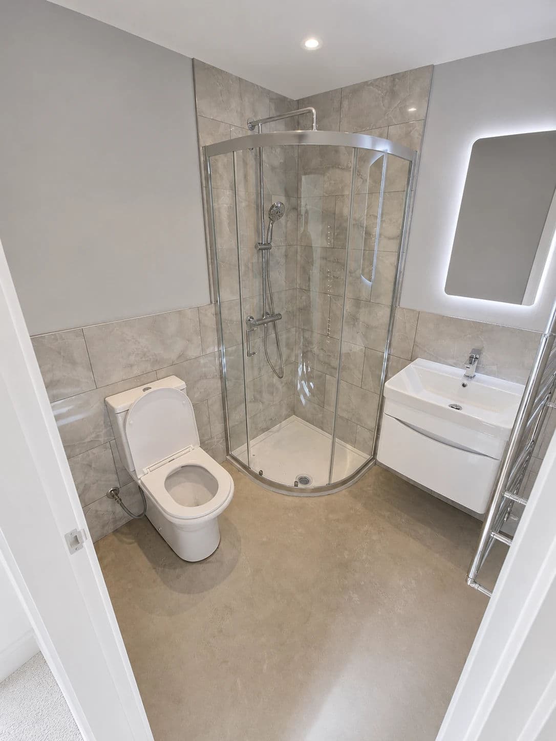 Bathroom Fitting Yarm with Quadrant Shower in Yarm — after completion. Services: Bathroom Installation, Bathroom Tiling, Shower Installation, Plumbing, Flooring.