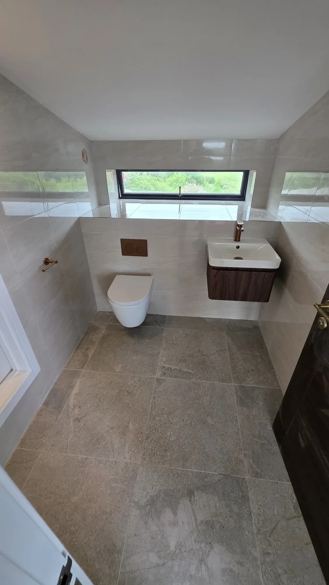 Cloakroom Installation Hartlepool with Wall-Hung WC in Hartlepool — after completion. Services: Bathroom Installation, Bathroom Tiling, Plumbing.