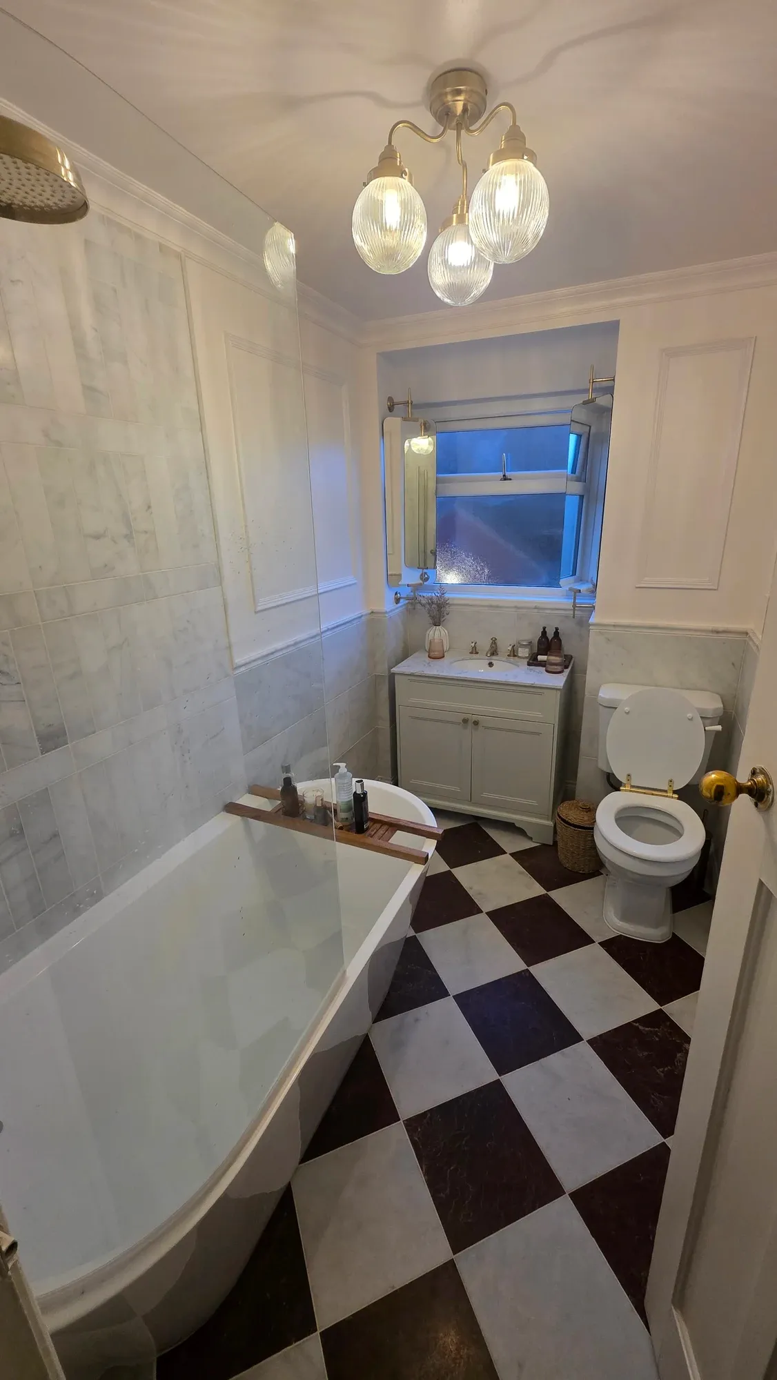 Bathroom Installation Marton, Middlesbrough with Marble Tiling in Middlesbrough — after completion. Services: Bathroom Installation, Bathroom Refurbishment, Bathroom Tiling, Plumbing, Lighting, Bathtub Installation.