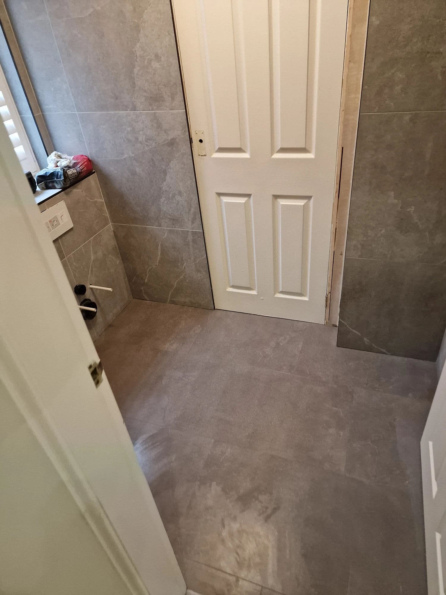 Yarm Cloakroom Installation with Slatted Access Doors in Yarm — before work began. Services: Bathroom Installation, Bathroom Renovation, Bathroom Refurbishment, Bathroom Tiling, Plumbing, Flooring.