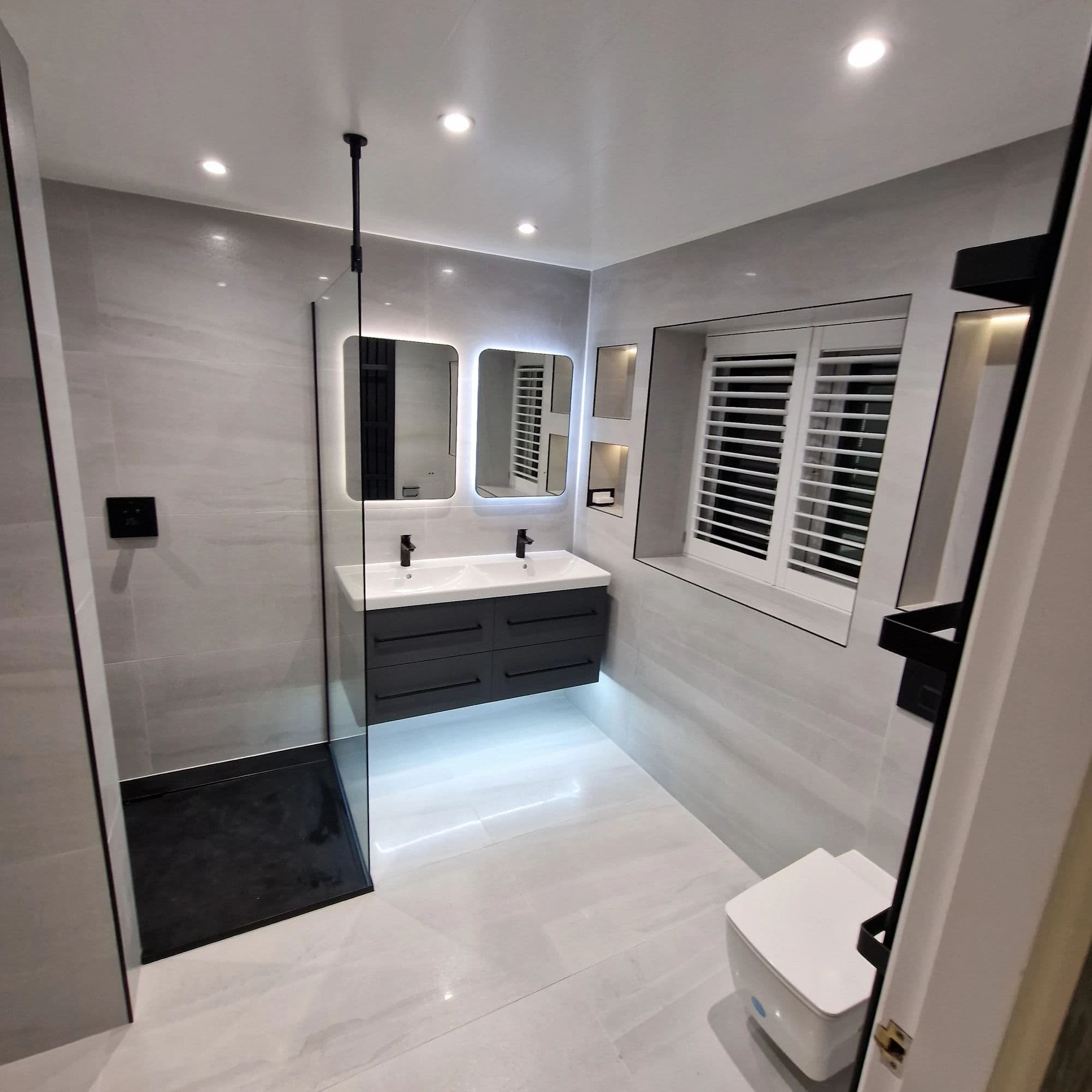 Yarm Luxury Bathroom Installation and Refurbishment with Walk-In Shower and Sauna in Yarm — after completion. Services: Bathroom Tiling, Lighting, Bathroom Renovation, Flooring, Plumbing, Shower Installation, Bathroom Installation, Shower Room, Bathroom Refurbishment.